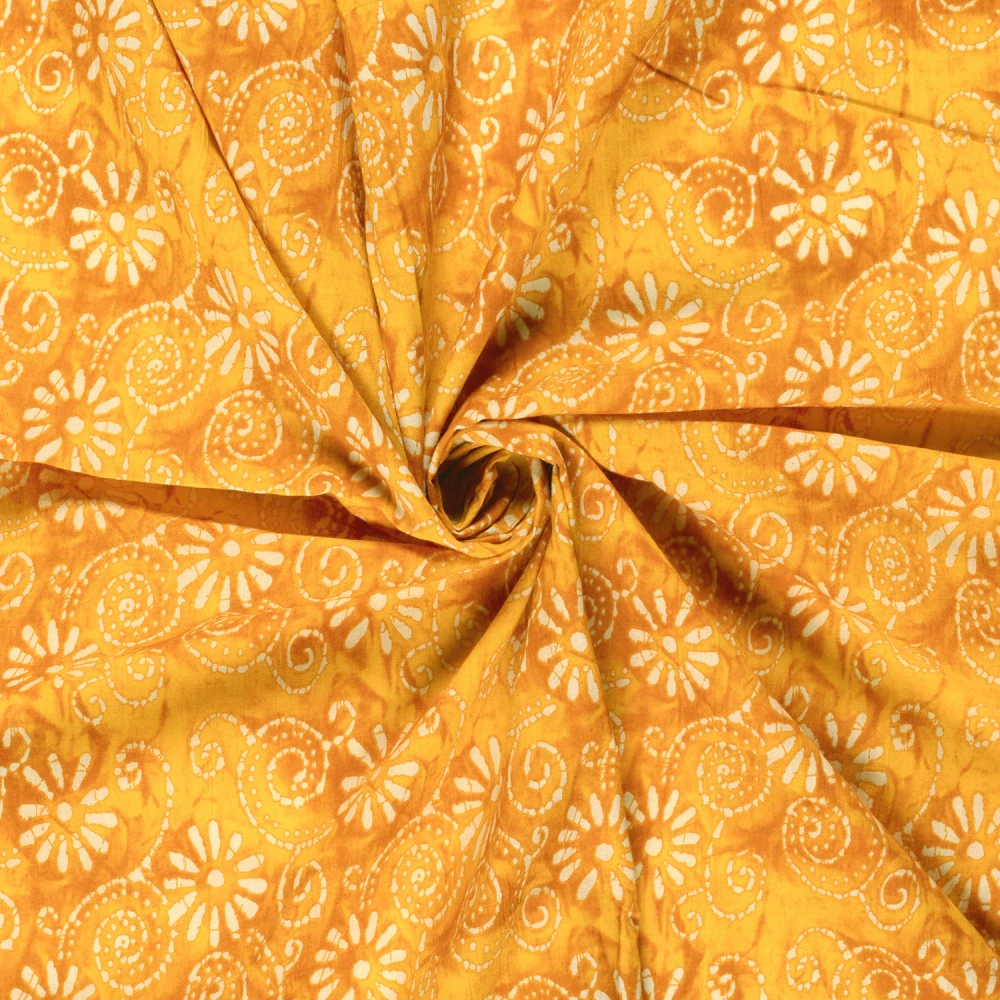 Bavlněný voál žlutý batikovaný Kytky