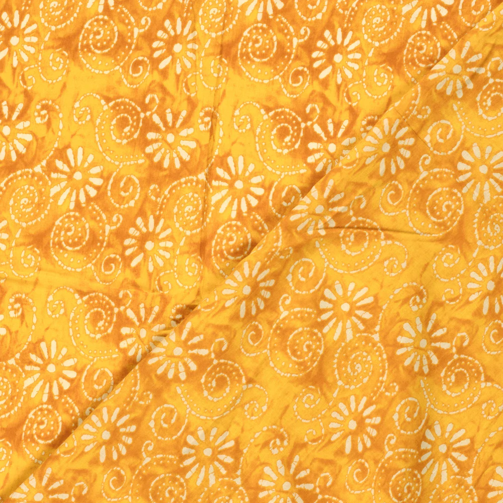 Bavlněný voál žlutý batikovaný Kytky